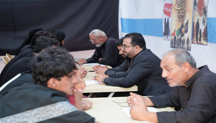 المجمع العلمي يواصل تقديم خدماته القرآنية لزائري الأربعين في بابل