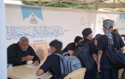 المجمع العلمي يواصل تقديم خدماته القرآنية لزائري الأربعين في بابل
