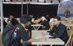 المجمع العلمي يفتتح محطّات تعليم القراءة الصحيحة للزائرين في بابل